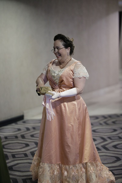 Reproduction 1890s Peach Ballgown at Costume College 2025. Photo by Art Andrews