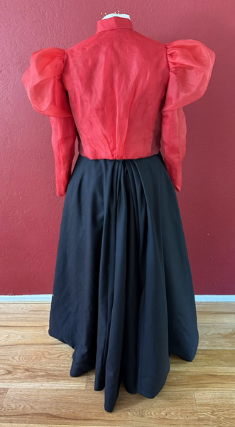 Reproduction 1890s Red Blouse and Black Skirt Back.  