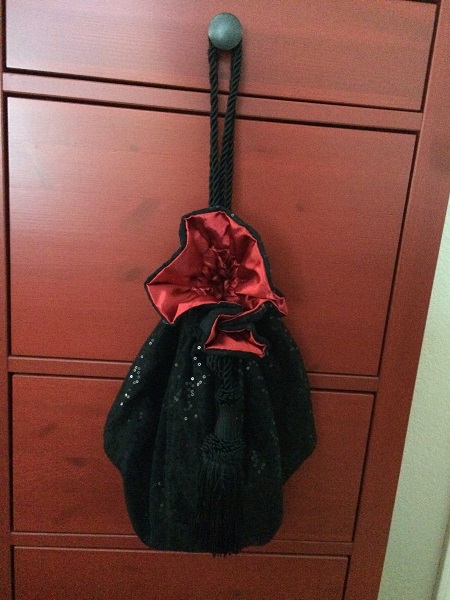 Reticule bag black sequined net over black satin, red lining