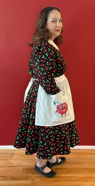 Reproduction 1950s Cherry Dress with Apron Right. Laughing Moon #134 Shirtwaist Dress
