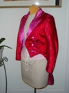 women's red and pink satin tailcoat left three quarter view