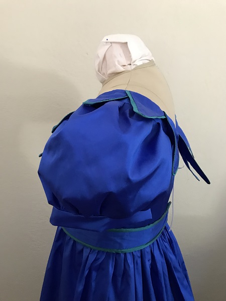 Reproduction 1820s Blue Dress with Van Dyke Points Bodice Left. 