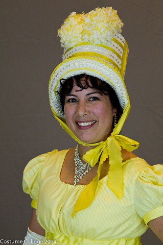 Reproduction Regency Yellow Dress and pom pom Hat. Photo by Andrew Schmidt.