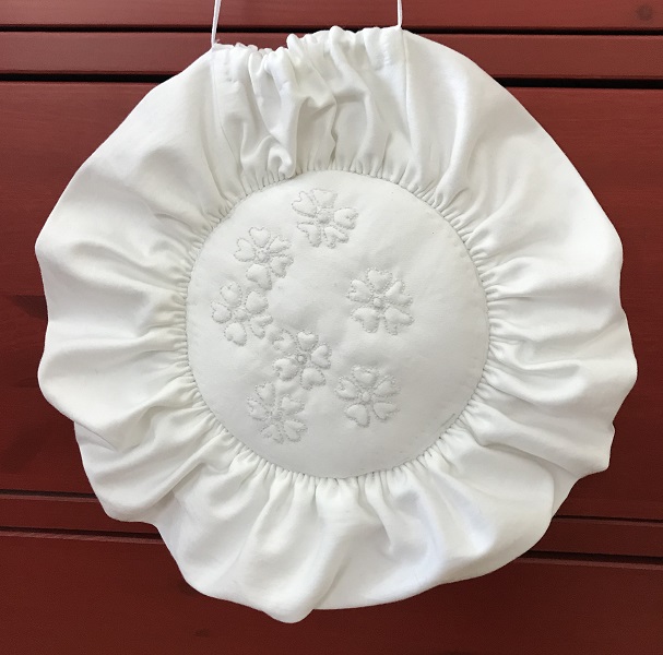 Reproduction White Cotton Round Detail Front.
